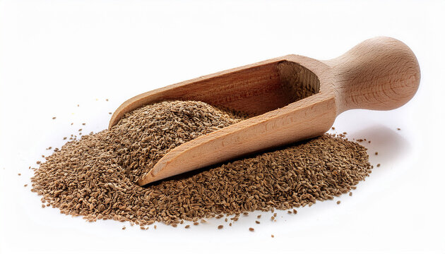 A Wooden Scoop Filled With Organic Carom Seeds Trachyspermum Ammi Or Ajwain Powder Placed Beside A Heap Of Carom Seeds Isolated On A White Background