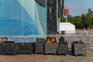 Equipment boxes on music stage for LED screen assembly