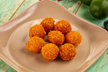 Fried crispy yellow cheese balls