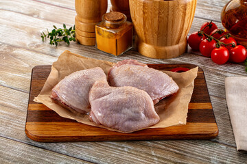 Raw chicken thighs for cooking