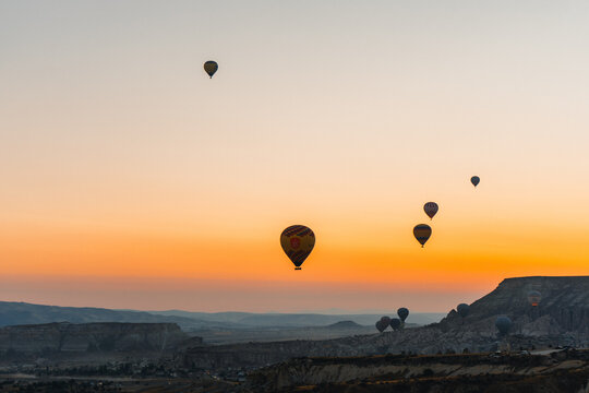 Colorful hot air balloon flying over Cappadocia, Turkey.