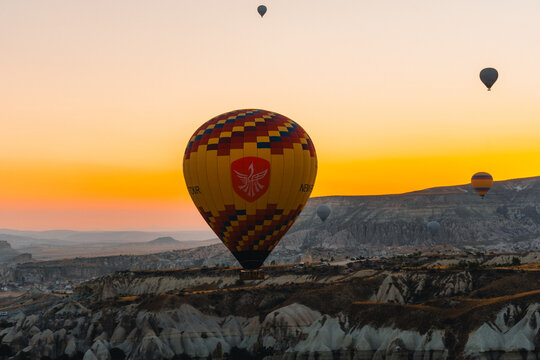 Colorful hot air balloon flying over Cappadocia, Turkey.