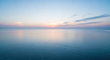 Fototapeta premium Serene Ocean Sunset with Gentle Waves and Colorful Sky