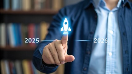 Person pointing at a glowing rocket icon, symbolizing growth and future goals between 2025 and 2026.