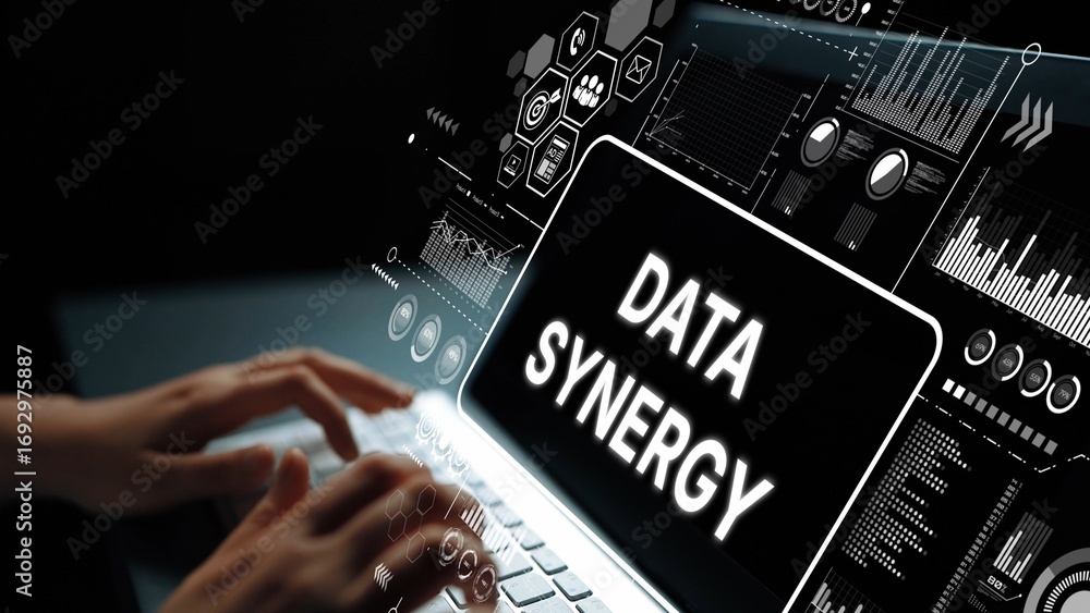 Poster hands typing on laptop with data synergy graphics showing technology and digital analysis concept. a