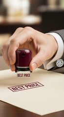 Close-up of hand stamping "Best Price" on paper, showcasing a business deal concept, representing affordability and value, ideal for sales or marketing promotions