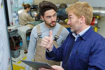 Obraz premium portrait of a mechanics talking