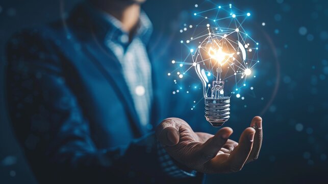 Businessman with illuminated lightbulb featuring ai symbol, symbolizing innovation and future tech