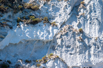 Scenic view of Ponza with rocky cliffs, turquoise sea and clear blue sky, coastal landscape of...