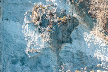 Scenic view of Ponza with rocky cliffs, turquoise sea and clear blue sky, coastal landscape of...