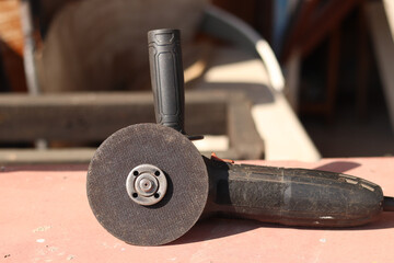 Angle grinders, power tools for construction and repair work. Tool for cutting and grinding hard...