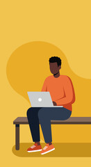 African American man uses laptop on a bench, symbolizing remote work, digital education, or freelance business in a casual setting.