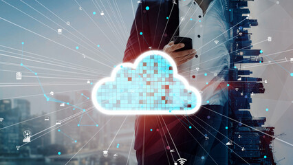 Two businessmen engage with cloud technology amidst a city backdrop, illustrating modern digital communication and connectivity in the corporate world. Xenic