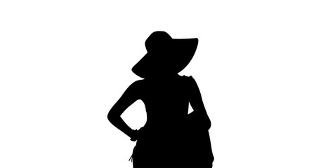 A striking silhouette of a woman wearing a wide-brimmed hat and a dress, positioned against a plain white backdrop.