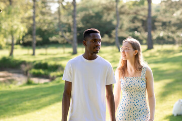 Obraz premium Romantic Interracial Couple Outdoors in Summer