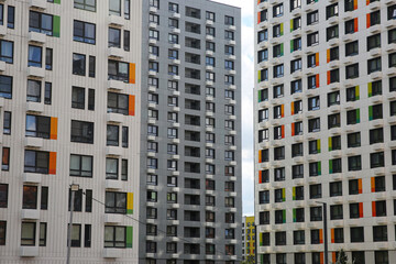 Fototapeta premium Facades of houses in the new microdistrict called Buninskie Lugy (