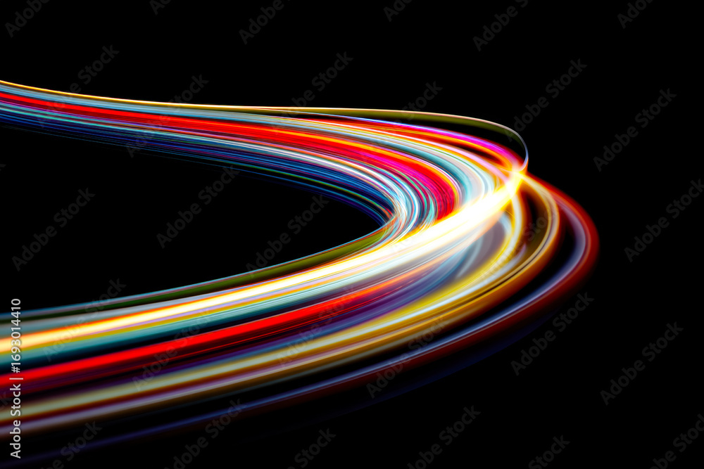 Poster dynamic light trails creating a vibrant streak of colors against a black background