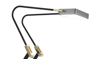 Modern desk lamp with sleek black arms and gold accents illuminates workspace