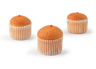 An assortment of mini cupcakes displayed in paper muffin liners, isolated on a clean white...