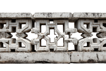 Aged decorative concrete balustrade with geometric cutouts.