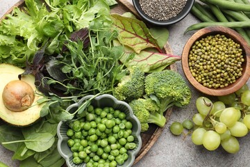 Superfood. Different healthy products on light grey table, flat lay