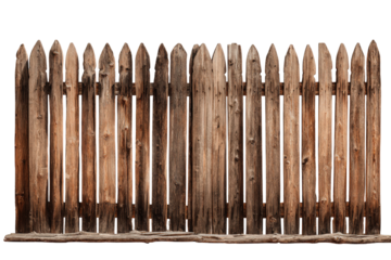 Old rustic wooden picket fence with sharp stakes.