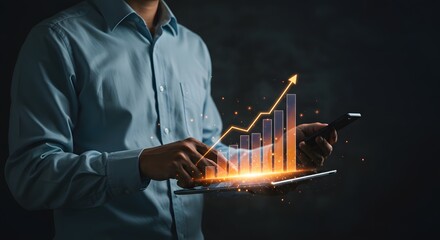 Businessman analyzing financial growth chart on tablet and smartphone