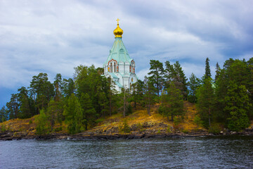 An elegant white church in the name of St. Nicholas of Myra . Valaam Island