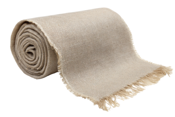 Soft beige woolen throw blanket with fringe rolled up.