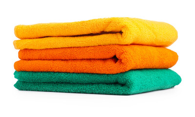 Stack of colorful terry towels isolated on white