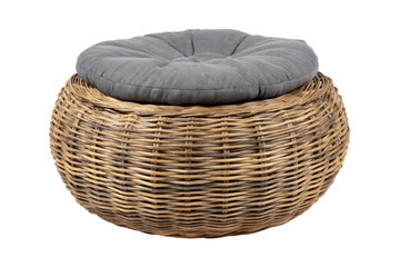 Obraz premium Round woven wicker ottoman with a soft grey cushion.