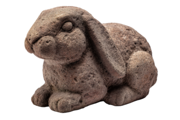 Weathered stone garden statue of a lop eared rabbit.