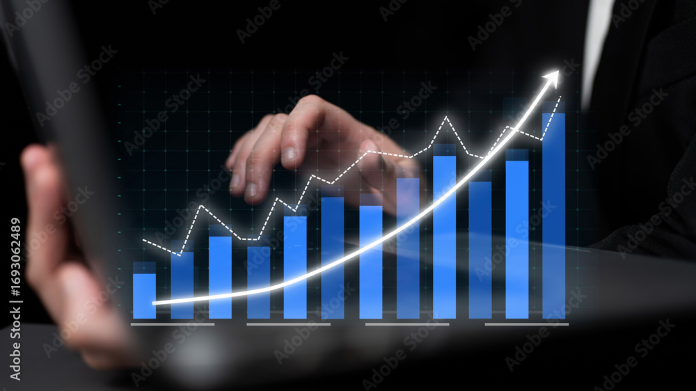 Poster a business professional analyzes growth data using a laptop, showcasing graphs and charts in a digit
