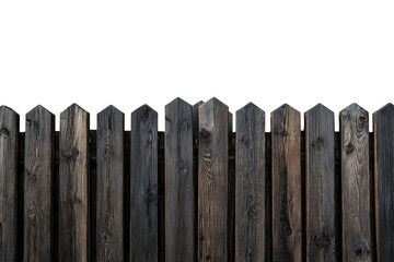 Fototapeta premium Old weathered dark wooden picket fence isolated on white.
