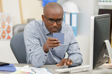 interior designer looking at swatches