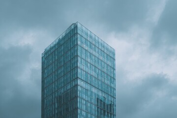 Modern skyscraper against a muted sky