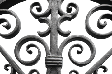 Monochrome Detail of a Vintage Wrought Iron Scrollwork Gate.