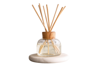 Aromatic reed diffuser with wooden sticks in a glass bottle.