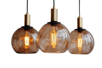 Three modern amber glass pendant lights with filament bulbs.