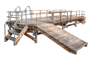Old weathered wooden pier with ramp and stairs isolated on white.