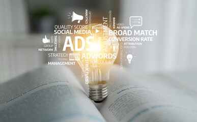 An innovative representation of advertising strategies featuring a light bulb illuminating key...