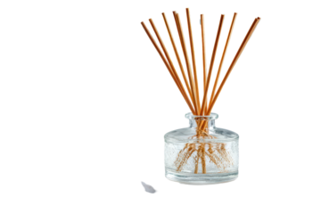 Aromatic reed diffuser with wooden sticks in a glass bottle.