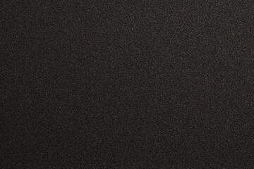 Closeup of black sandpaper texture
