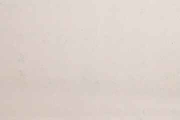 Faintly mottled off-white paper texture
