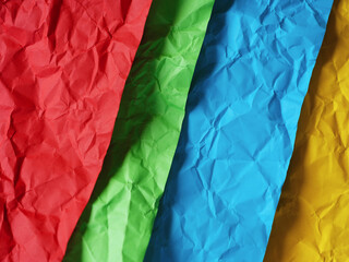 Colorful sheets of crumpled paper. Close up.