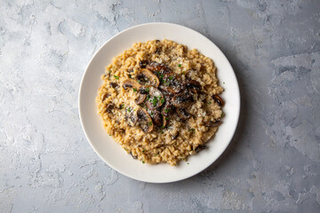 Mushroom risotto topped with parmesan cheese