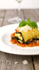 Zucchini rolls with tomato sauce
