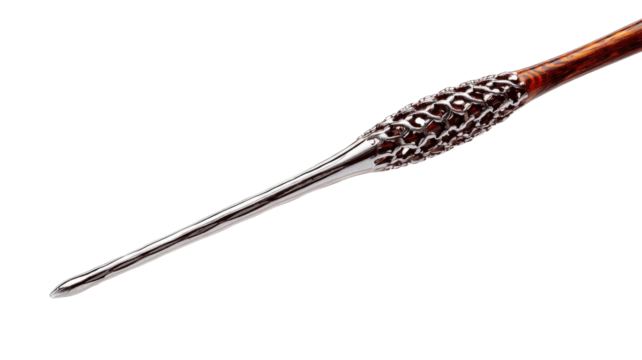 Close-up of a pointed wand.  Dark brown wooden shaft with  metal,  faceted  knob at the handle.  Shiny silver tip