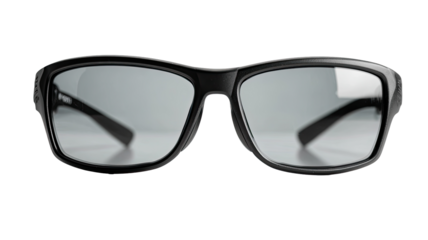 Close-up of black rectangular sunglasses.  Gray lenses,  dark background