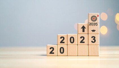 Wooden blocks forming a staircase, representing years 2020-2026, with a target and upward arrow